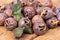 Healthy ripe Medlars on the old wooden table