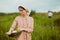 The healthy rural life. The woman in the green field