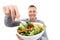 Healthy salad, food and vegetable with a man in studio for health, wellness and nutrition. Model person with green vegan