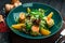 Healthy salad with salmon, zucchini, cream cheese and orange
