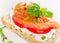 Healthy Sandwich with cereals bread and salmon on plate.