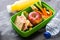 Healthy school lunch box: Sandwich, vegetables ,fruit and juice