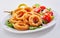 Healthy seafood appetizer of squid and Greek salad