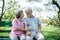 Healthy senior couple relaxing  seats on Chair