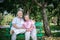 Healthy senior couple relaxing  seats on Chair