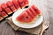 Healthy slice watermelon on a wood background