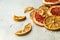 Healthy slices of citrus on gray texture background