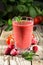 Healthy smoothie in a glass with strawberries