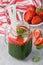 Healthy smoothies with spinach, strawberries, and Basil