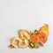 Healthy snack. Homemade dehydrated fruit chips on a white background. Dry kiwi, banana, javblock, persimmon, pear. Dietary