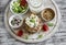 Healthy snack - rye crackers, cottage cheese with cucumber and flax seed