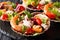 Healthy snack salad of seafood shrimp, baby octopus, mussels and