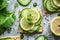 a healthy snack with vegetables, lemon, avocado and crackers