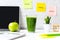 Healthy snack with working in office.  Green apple and vegetable smoothie for diet Health with laptop