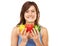 Healthy. Studio portrait of an attractive young woman holding different colored peppers isolated on white.