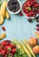 Healthy summer fruit variety. Sweet cherries, strawberries, blackberries, peaches, bananas, melon slices and mint leaves