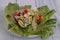 Healthy summer salad with lettuce, tomato, apple, onion etc.immunity boosting vitamins