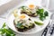 Healthy tasty toast with avocado, white cheese and boiled egg