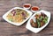 Healthy and tasty veg fried rice and paneer chilly dry with tomato sauce served in bowl over a rustic wooden background, Indian