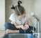 Healthy thirsty caucasian child drinking from water tap or faucet in kitchen. Hands open for drinking tap water. Pouring clean