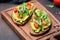 Healthy toast with avocado, tomato, arugula