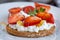 Healthy toast with strawberry, cottage cheese and honey. Tasty breakfast. Summer appetizer