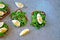 Healthy toasts with arugula and egg. Keto lunch. Open sandwiches with greens and eggs.