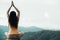 Healthy traveler woman lifestyle balanced practicing meditate and zen energy yoga outdoors in morning the mountain nature.