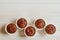 Healthy vegan beetroot muffins in white cups on wooden background. Festive composition, copy space available. Flat lay. Film