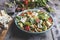 Healthy vegan salad with avocado ,beet leaves ,chickpea, broccoli ,tomato,blue cheese