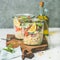 Healthy vegan salad with quionoa, avocado, dried tomatoes, square crop