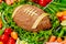 Healthy vegetable platter with meatloaf like a football ball for american football game party. Close up