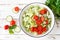 Healthy vegetable salad of chinese cabbage, corn, cucumbers and tomatoes. Delicious vegetarian dietary lunch. Vegan food. Top view
