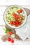 Healthy vegetable salad of chinese cabbage, corn, cucumbers and tomatoes. Delicious vegetarian dietary lunch. Vegan food. Top view