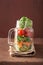 Healthy vegetable salad in mason jar. tomato, broccoli, carrot,