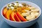 Healthy Vegetarian Breakfast Bowl of Muesli Fruit and Nuts With Yogurt