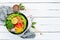 Healthy vegetarian food. Bowl Buddha. Avocados, broccoli, turkey peas, corn. Top view.