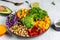 Healthy vegetarian food concept. Buddha bowl vegetarian, vegan dish with avocado, tomato, red cabbage, chickpea, fresh lettuce