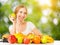Healthy vegetarian food. happy woman eating apple in summer