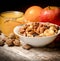 Healthy vegetarian food - organic nuts, orange juice and fruits