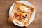 Healthy vegetarian homemade food: crepes or thin pancakes with cheese, egg, tomatoes and mushrooms
