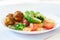 Healthy vegetarian noodles with broccoli cherry tomato and falafel