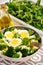 Healthy vegetarian salad with eggs, broccoli, corn and cheese