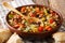 Healthy vegetarian three beans soup with vegetables in a bowl close-up. horizontal