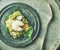 Healthy vegetarian wholegrain avocado toasts with poached egg, top view