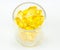 Healthy vitamin glass : yellow oil pills in translucent glass