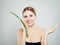 Healthy woman with aloe leaf showing empty copy space