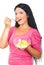 Healthy woman eating cornflakes cereals