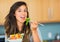 Healthy woman eating salad