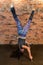 Healthy woman during flowing yoga class